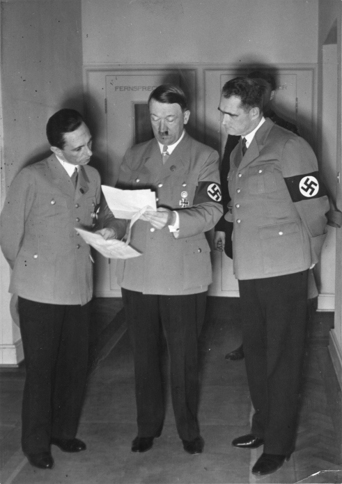 Adolf Hitler reviews the results of the plebiscite for Austria with Joseph Goebbels and Rudolf Hess